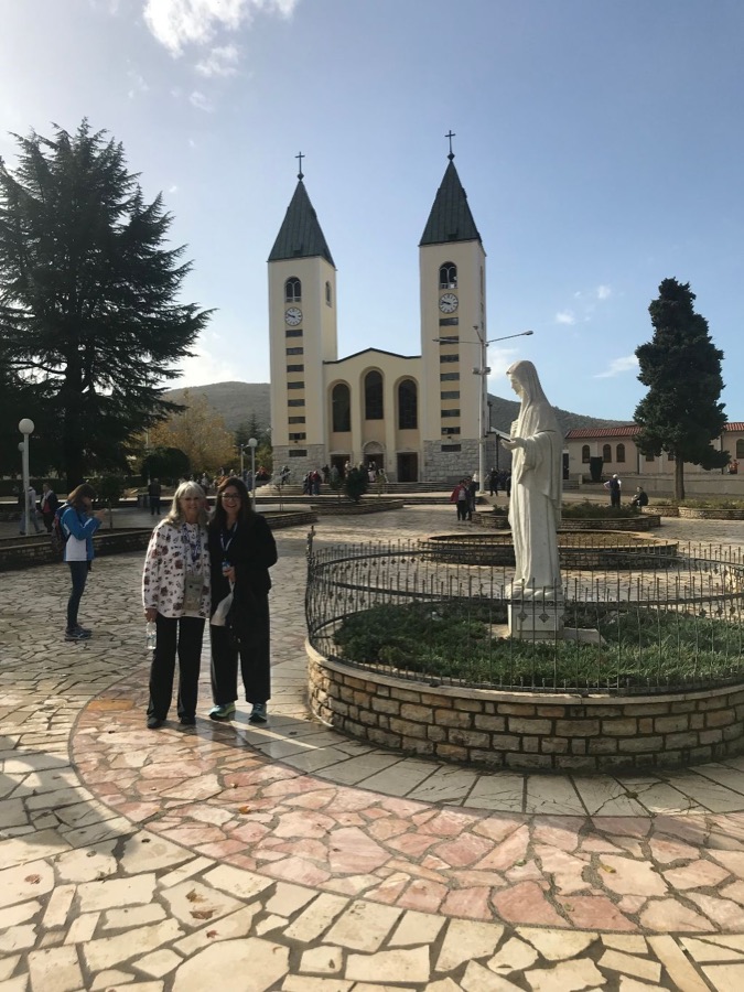 Debbie in the square before St James, Medjugorje