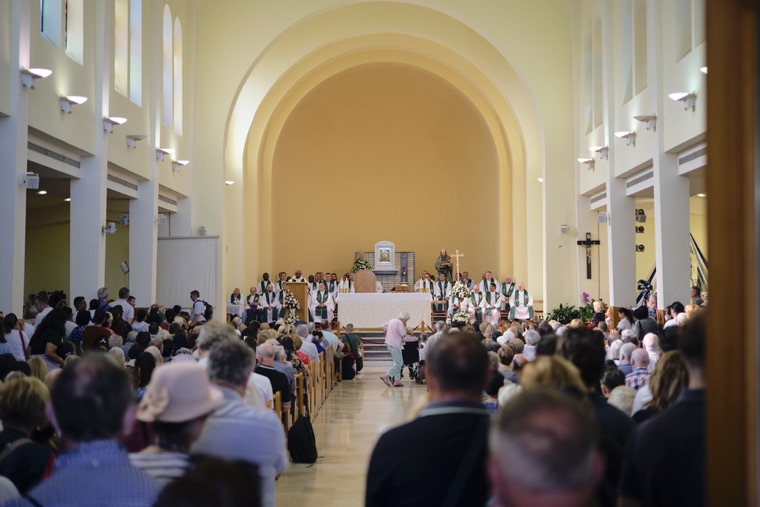 Mass in a full church