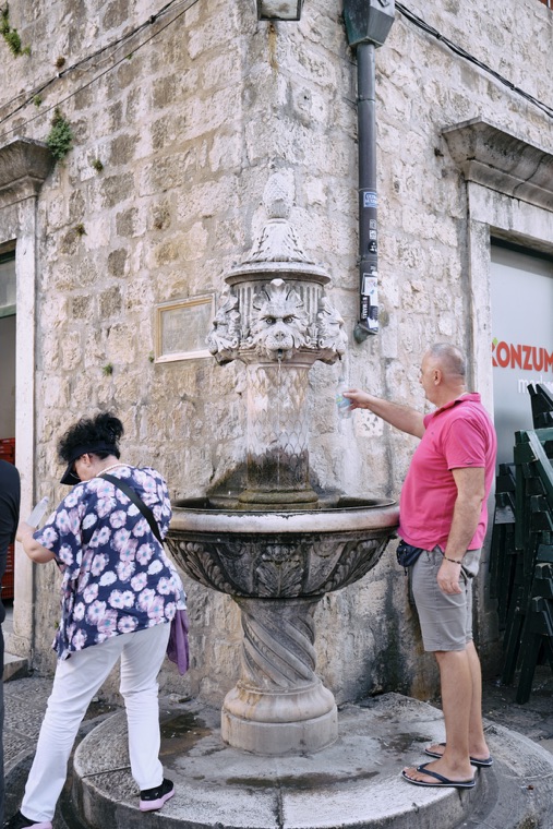 A stone fountain in the old town