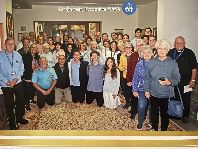 A Triumph group together indoors, Medjugorje, November 2025