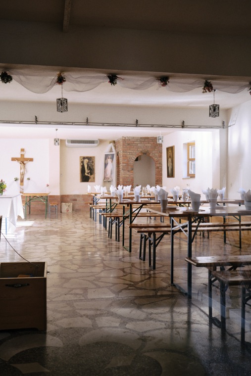 The dining hall, set for pilgrims