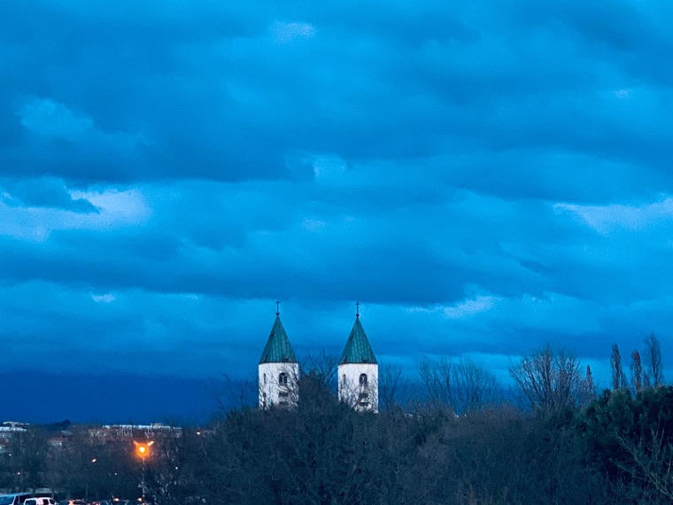 The towers of St James at dusk