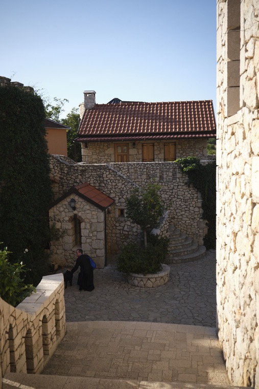 Stone steps down to a courtyard and chapel