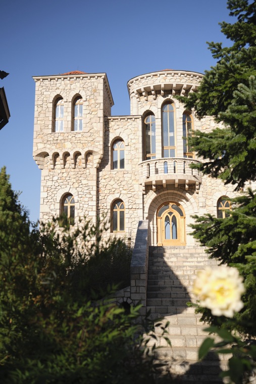 A stone building with towers